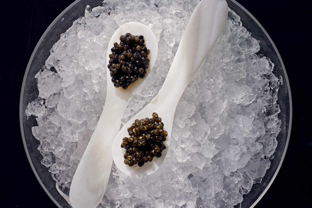 Caviar on spoons served on ice