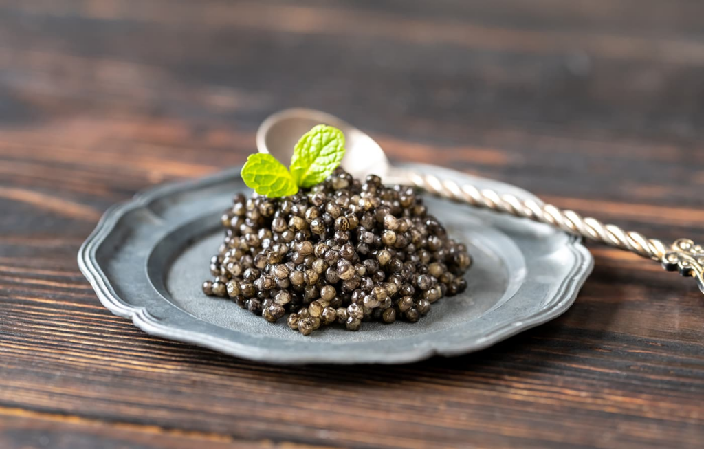 Caviar on a plate with a spoon